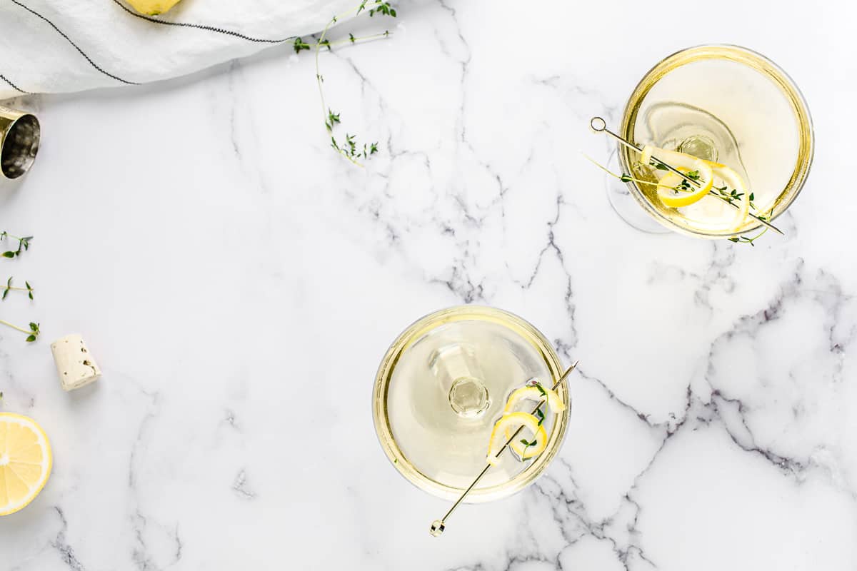 limoncello thyme spritzer in a coupe glass - overhead