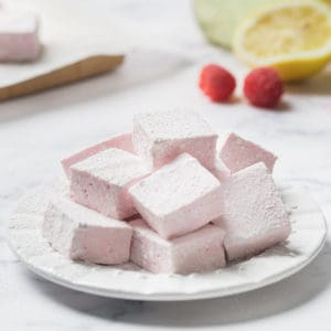 pink raspberry lemon marshmallows on a plate