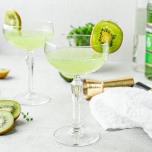 straight on shot of daiquiris with kiwi garnish