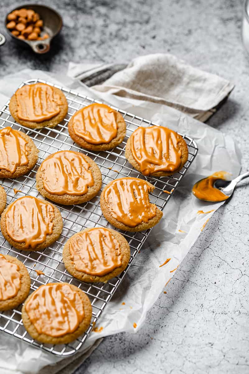 butterscotch cookies with fresh glaze on a cooling rack