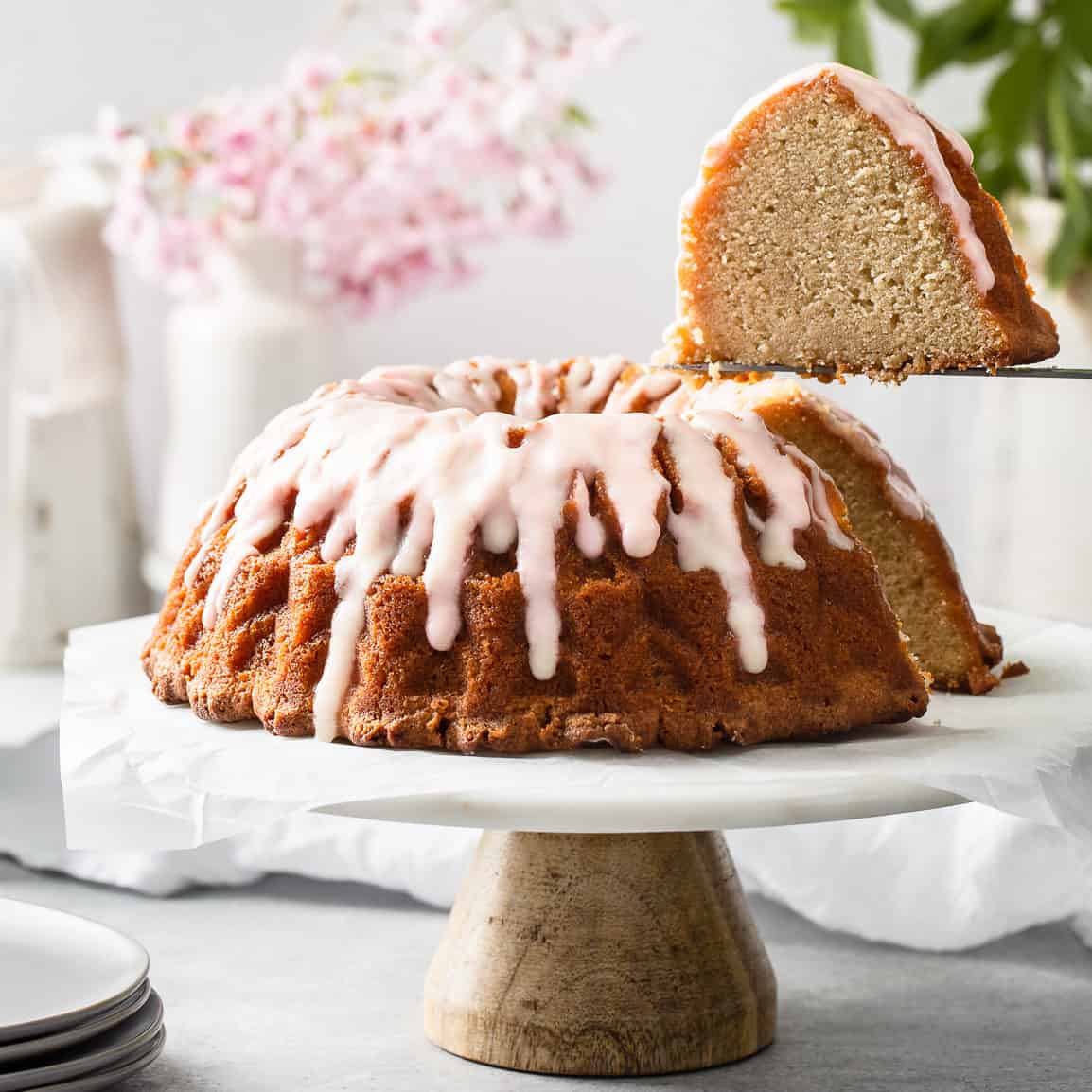 bundt cake with a slice being taken out