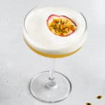 top view of Passionfruit Mango Sour with passionfruit garnish
