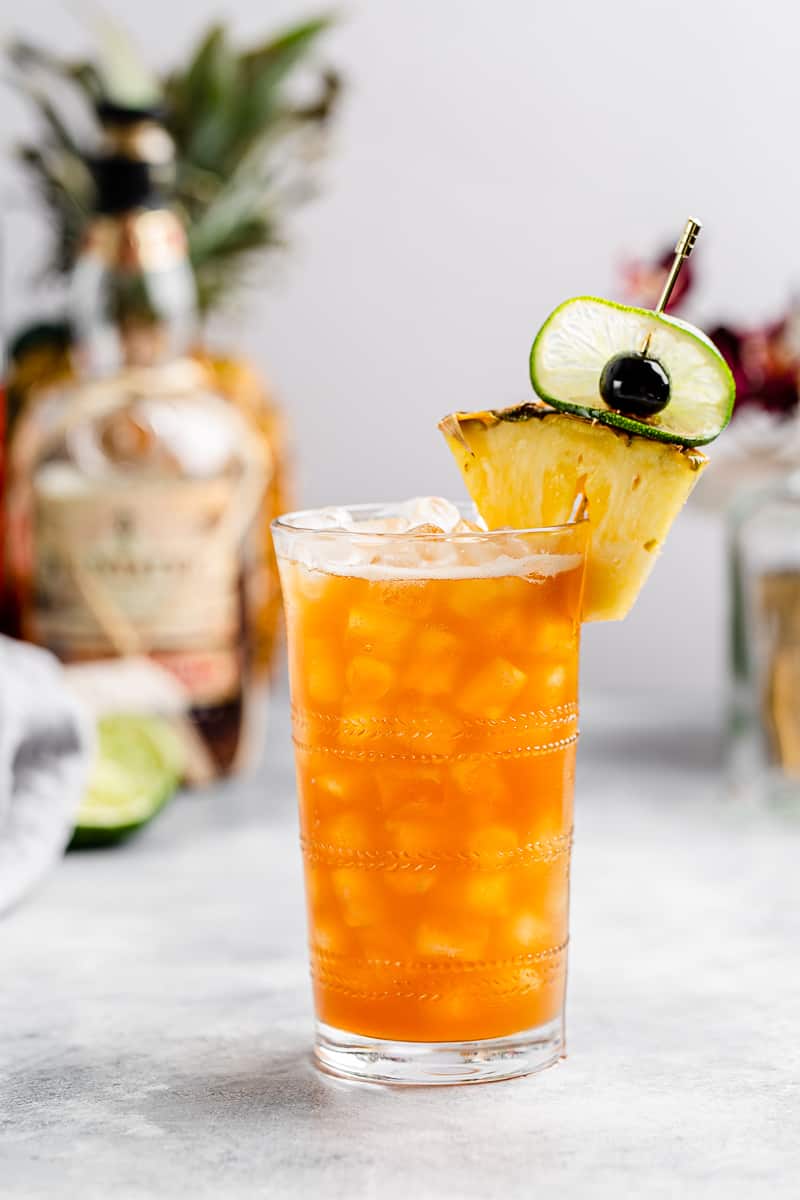 Rum and Ramazzotti cocktail, a take on the classic Jungle Bird cocktail, in a tall glass with lots of ice