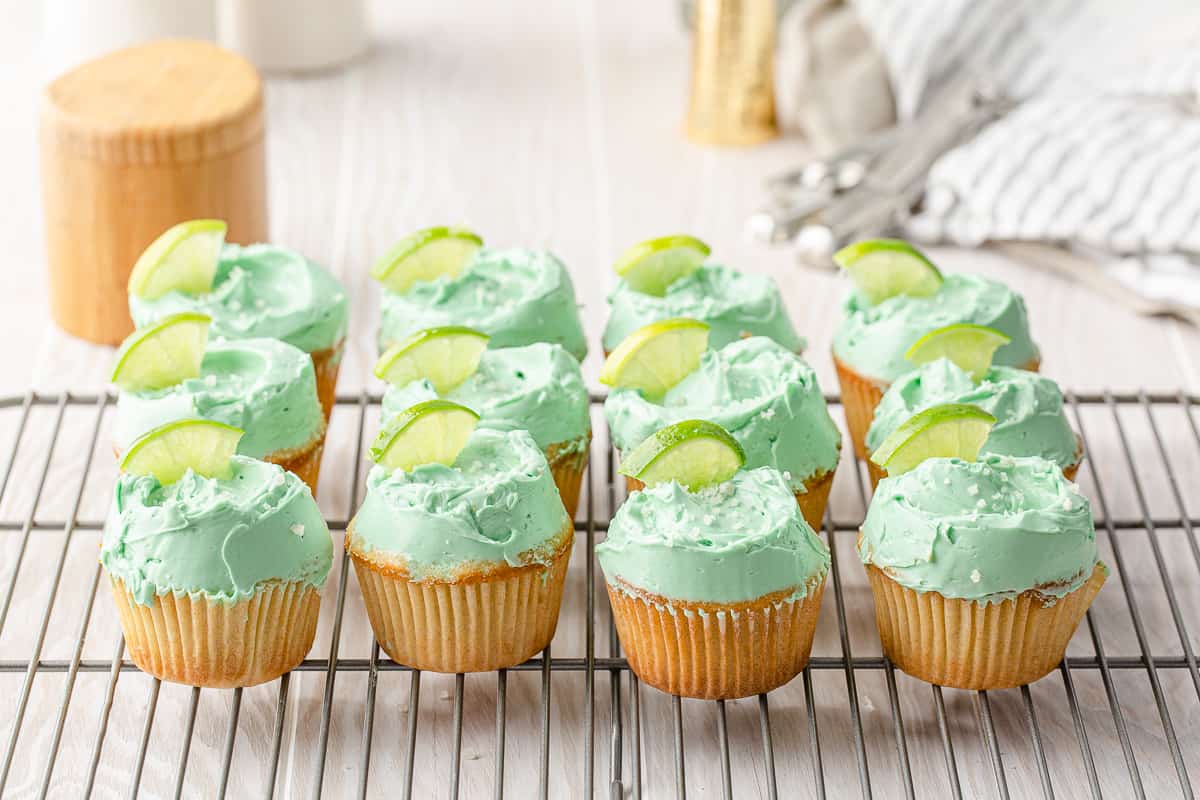 rows of margarita cupcakes on a cooling rack