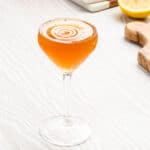 top view of cocktail with droplet splashing into it