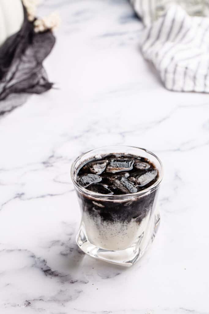 top view of black and white rum cocktail