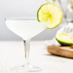 side view of gimlet cocktail with lime garnish