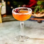 sugar plum cocktail with a rum cherry garnish