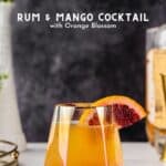 Side view of Rum Mango Cocktail with a blood orange garnish, with the text "Rum & Mango Cocktail with ORange Blossom".