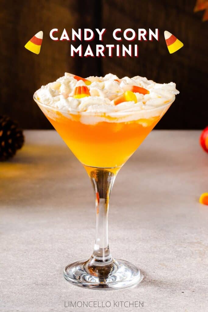 Candy corn martini cocktail in a martini glass, with the text saying Candy Corn Martini across the top and two candy corn illustrations next to the text.