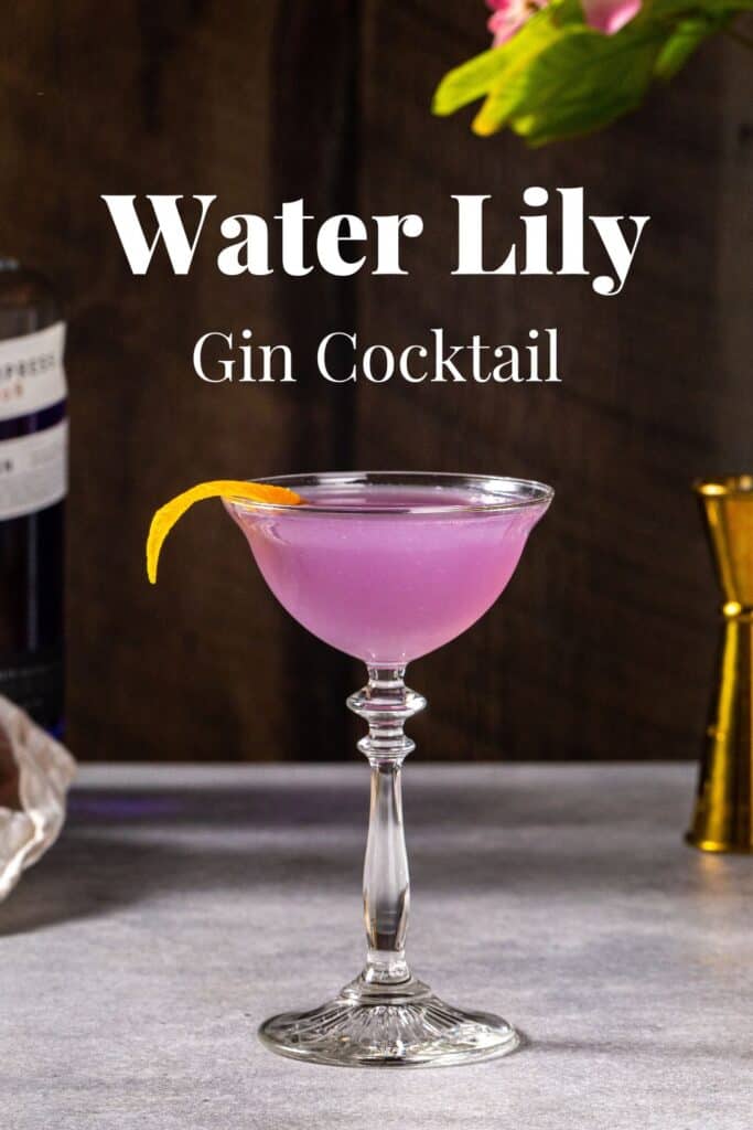 Purple water lily cocktail on a gray countertop. Text overlay reads "water lily gin cocktail".