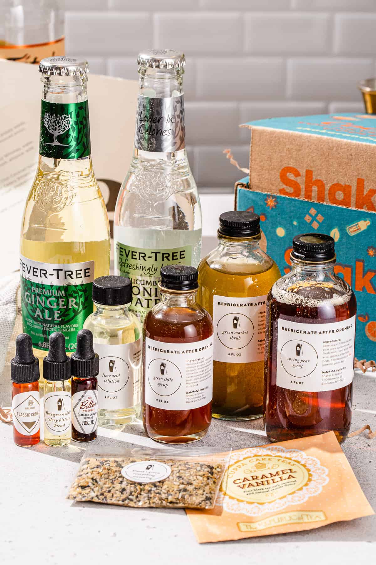All of the contents of the Shaker & Spoon Vodka Brunch box together on a countertop.