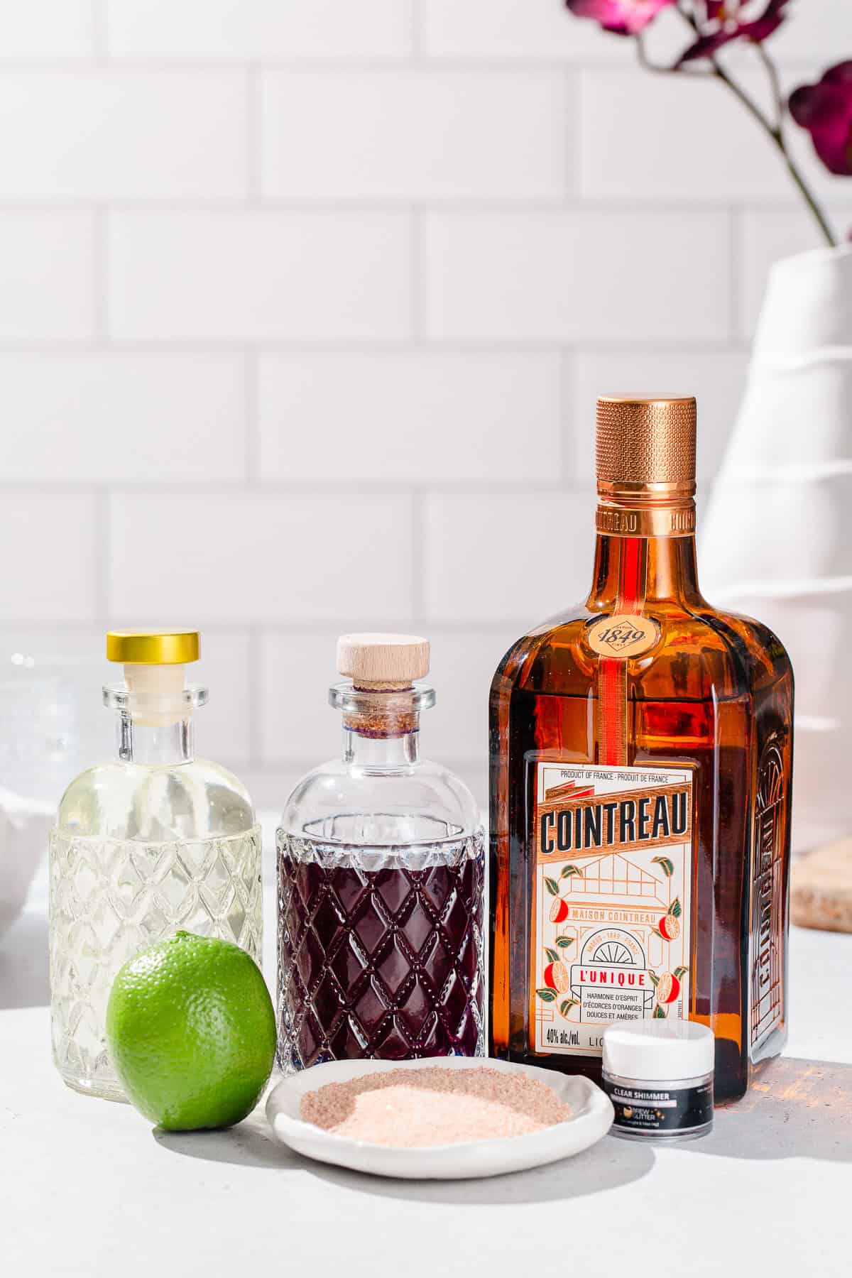 Ingredients to make a Galaxy Margarita together on a countertop.