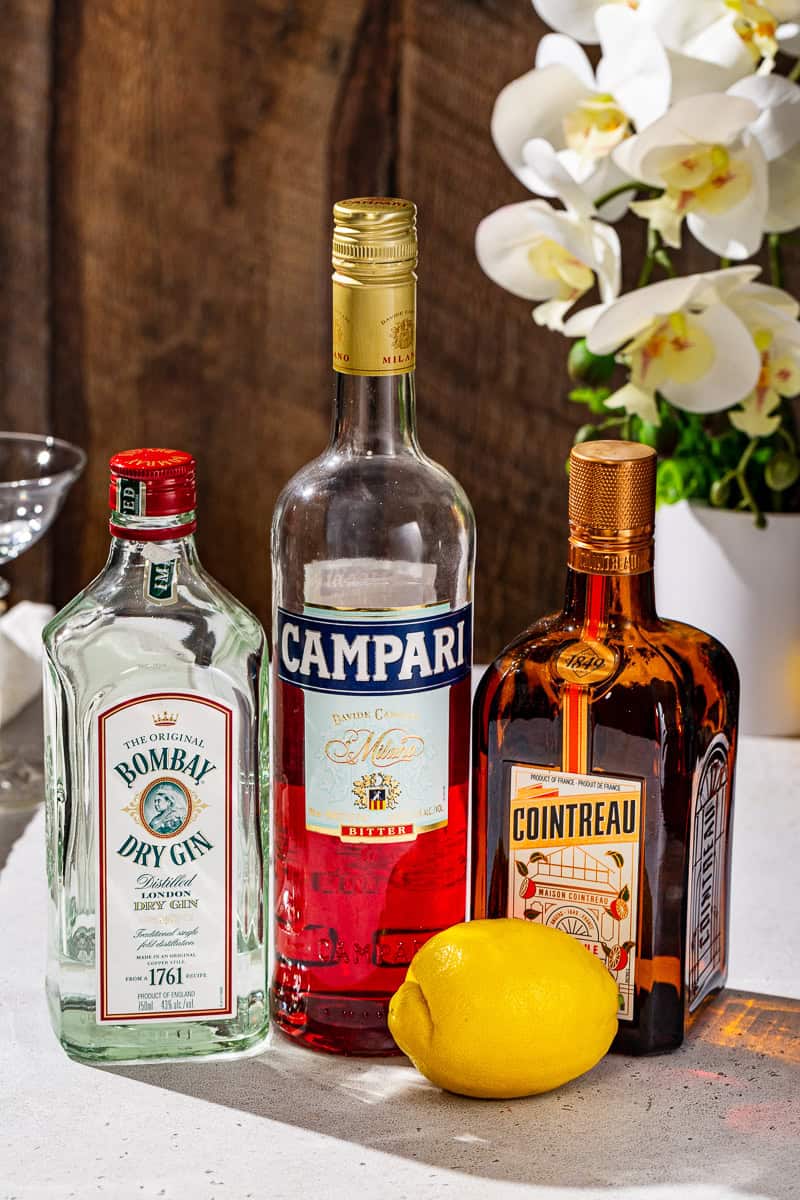Ingredients to make a Jasmine Cocktail together on a countertop.